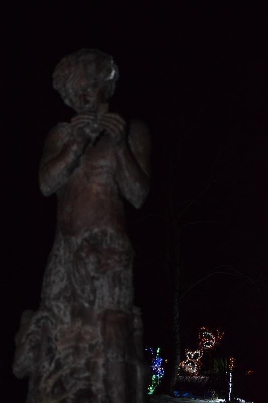 A statue and lights